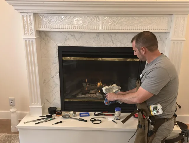 Redondo Beach Chimney Sweep performing fireplace maintenance in Redondo Beach, CA